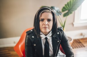 Portrait of woman in leather jacket